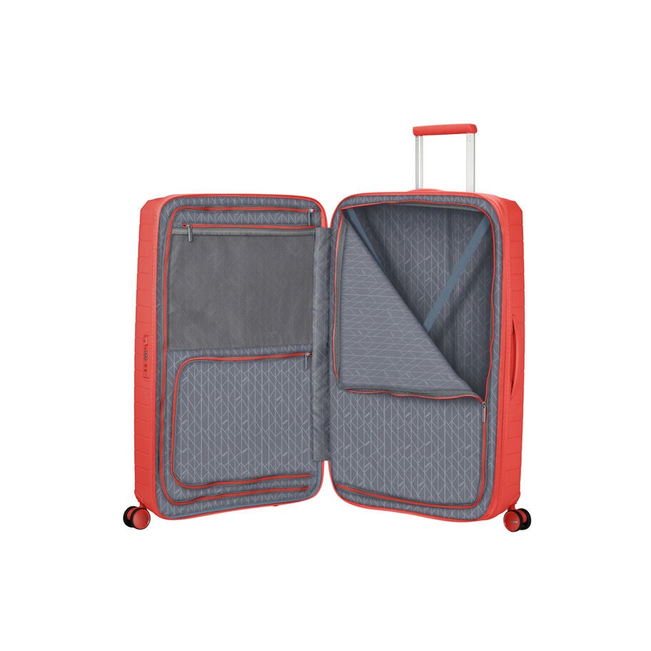 American Tourister FastForward Spinner Large in the color Sunset Coral. image number 1