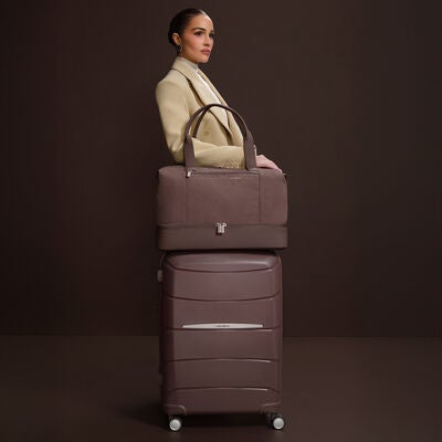 Samsonite Outline Pro Spinner Medium in the color Chocolate Mauve.
