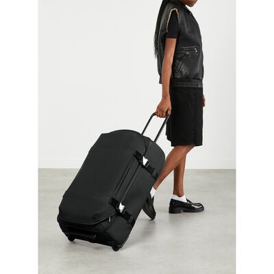 Lipault LOST IN BERLIN Wheeled Duffle in the color Black.