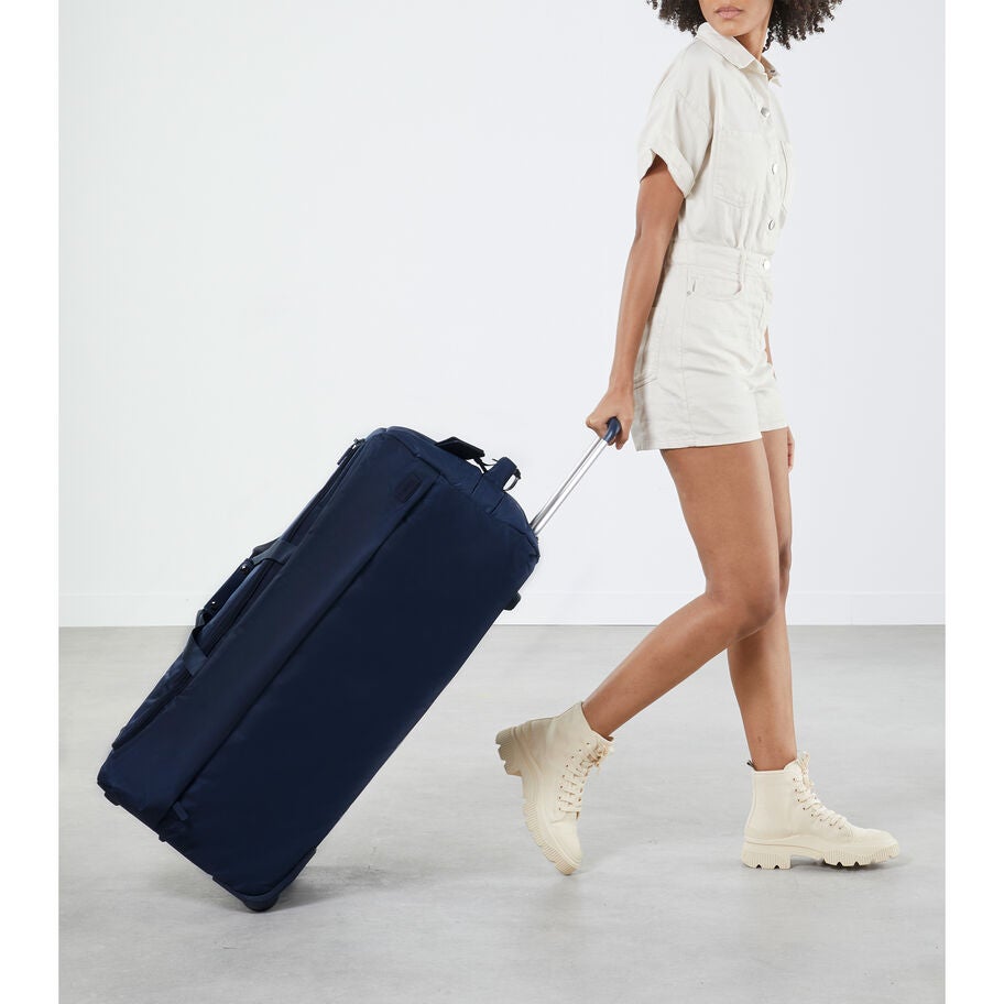 Lipault Foldable Plume Wheeled Duffle (78/29) in the color Navy. image number 1