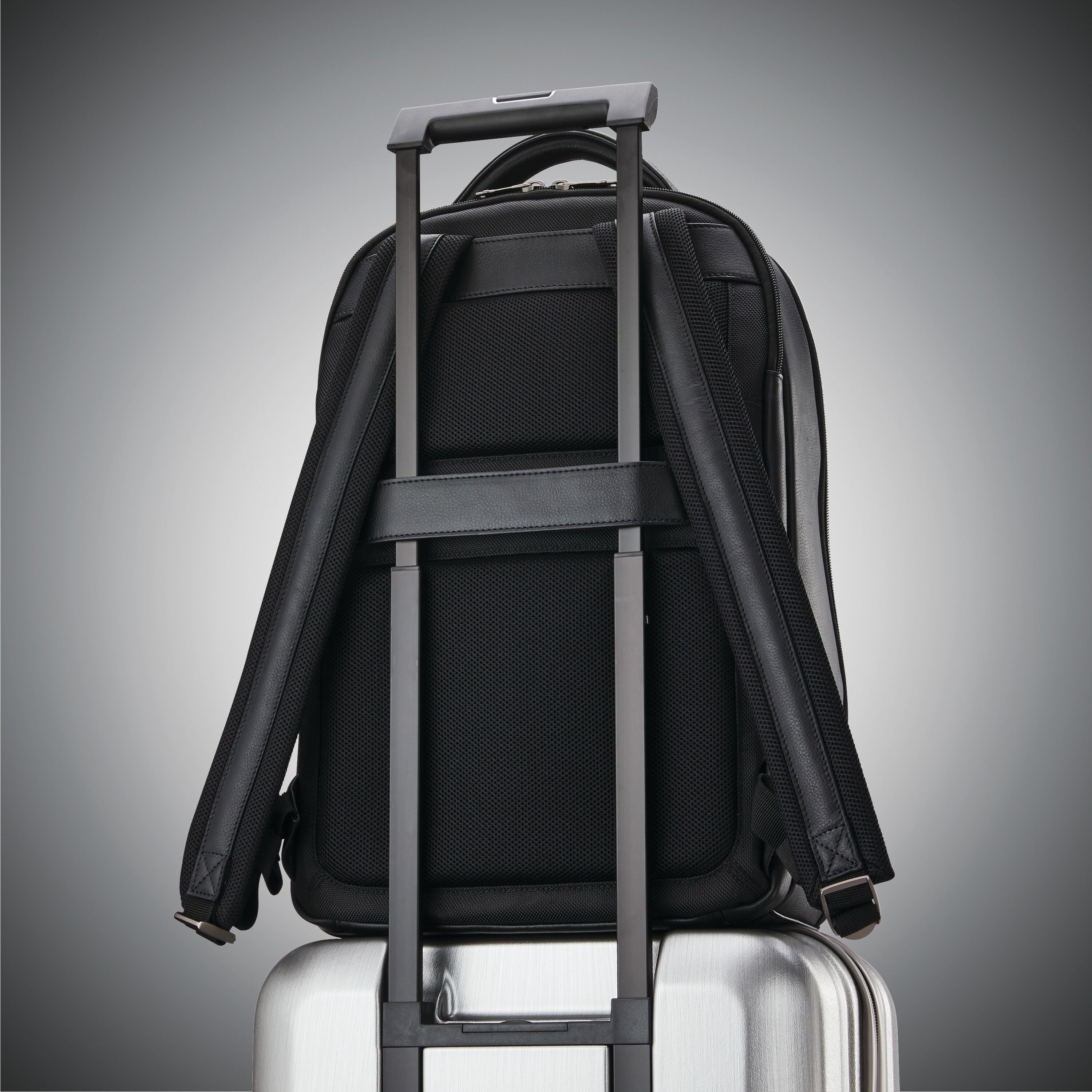 Leather backpack with luggage sleeve deals