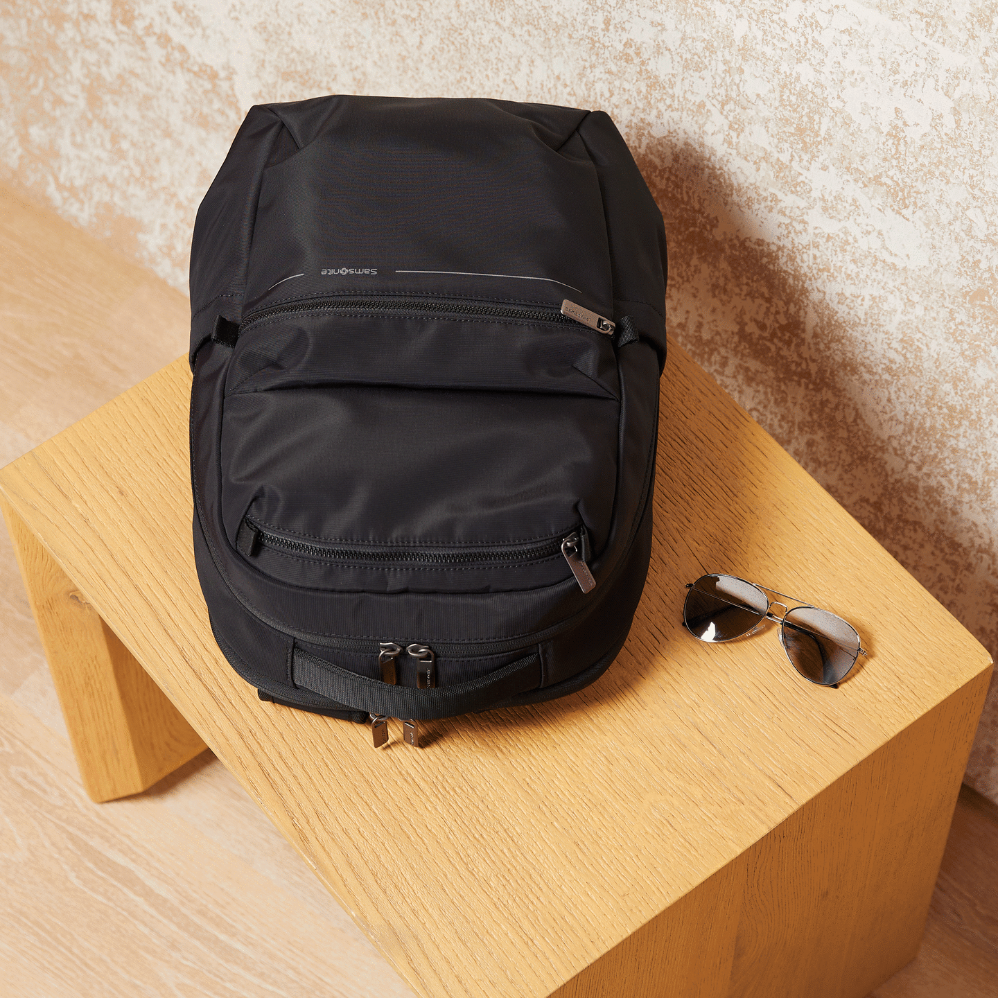Keep your belongings organized with multiple zip pockets and dedicated compartments. Thoughtfully designed to carry your everyday items including a water bottle pocket, hidden stash pocket for valuables, and a fully padded laptop sleeve.
